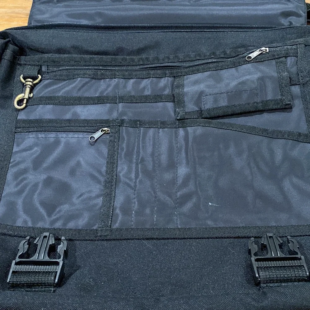 Black shoulder brief case bag with lots of pockets